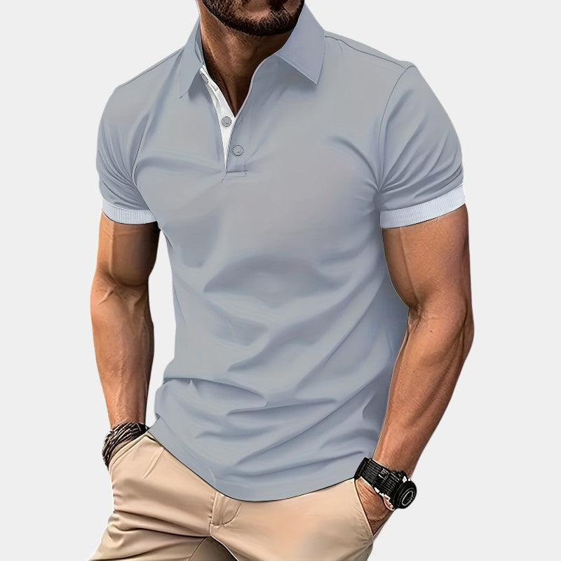 Stilig golfskjorte til herre i funksjonell polyester, designet for bevegelsesfrihet og komfort.