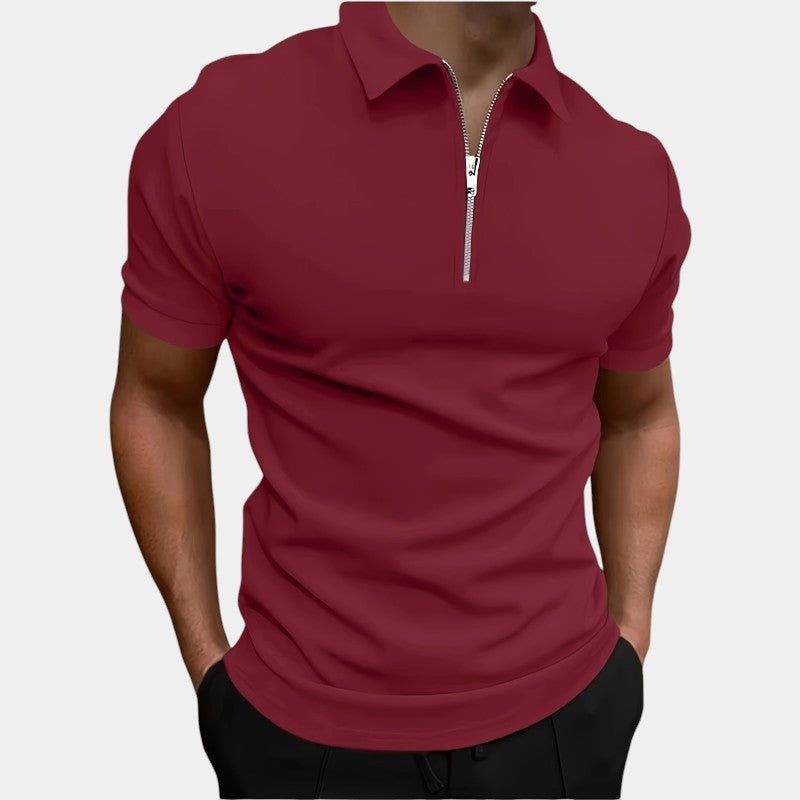 Funksjonell herre golfskjorte i polyester, glidelås, elastisk, korte ermer. Ideell for golf.