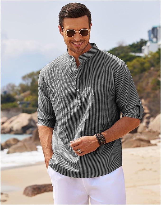 Allsidig herre Henley skjorte i mykt stoff, med lange ermer og praktiske rulleoppslag.