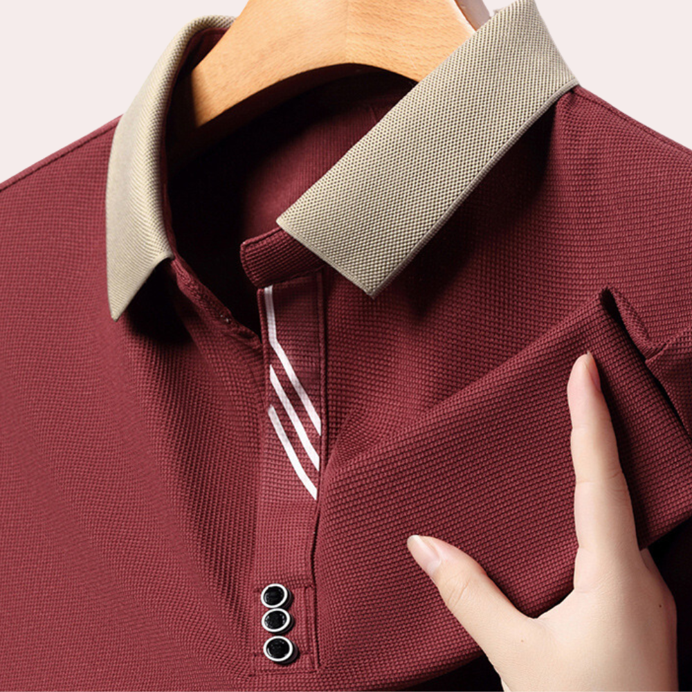 Klassisk svart langermet poloshirt med knapper. Robust kvalitet for menn, egnet for både jobb og fritid.