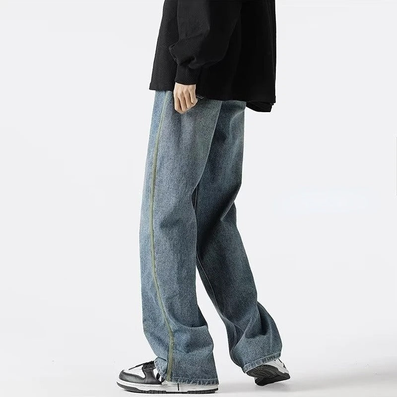 Stilige svarte herre oversized jeans med elastisk midje. Komfortable fritidsbukser for en trendy look.