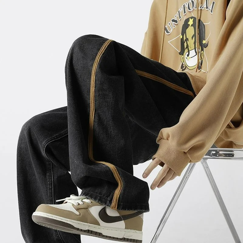 Komfortable herre oversized jeans, blå denim med elastisk midje. Moderne stil for fritid og hverdagsbruk.