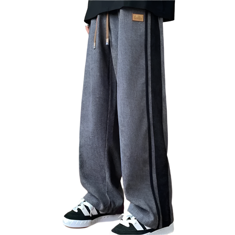 Herre oversized joggebukser i myk tekstur for avslappet stil. Komfortable fritidsbukser med snøring i midjen.
