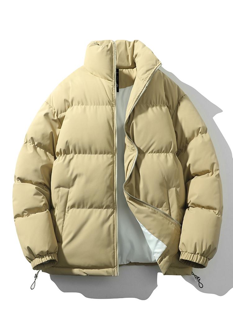 Klassisk quiltet herrejakke med trendy ståkrage, en varm og allsidig vinterfavoritt for menn.