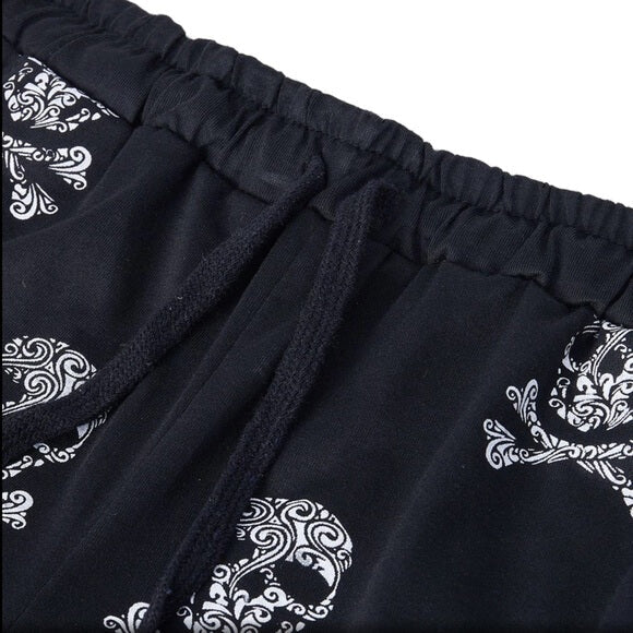 Allsidig herre joggebukse med skull-design, perfekt for en avslappet, sporty eller trendy fritidslook.