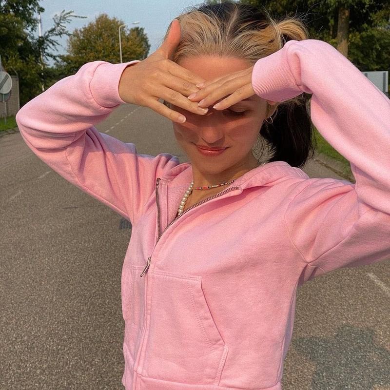 Frontbilde av rosa herre glidelås hettegenser, perfekt for trening.