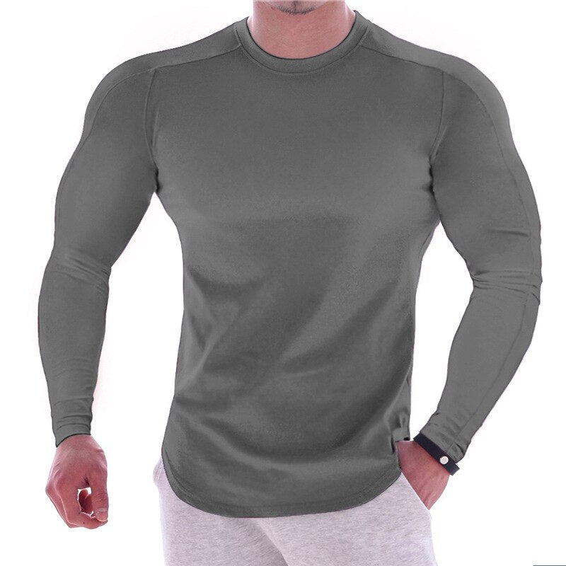 Slitesterk langermet sportsskjorte i polyester for herre. Hurtigtørkende for optimal komfort.