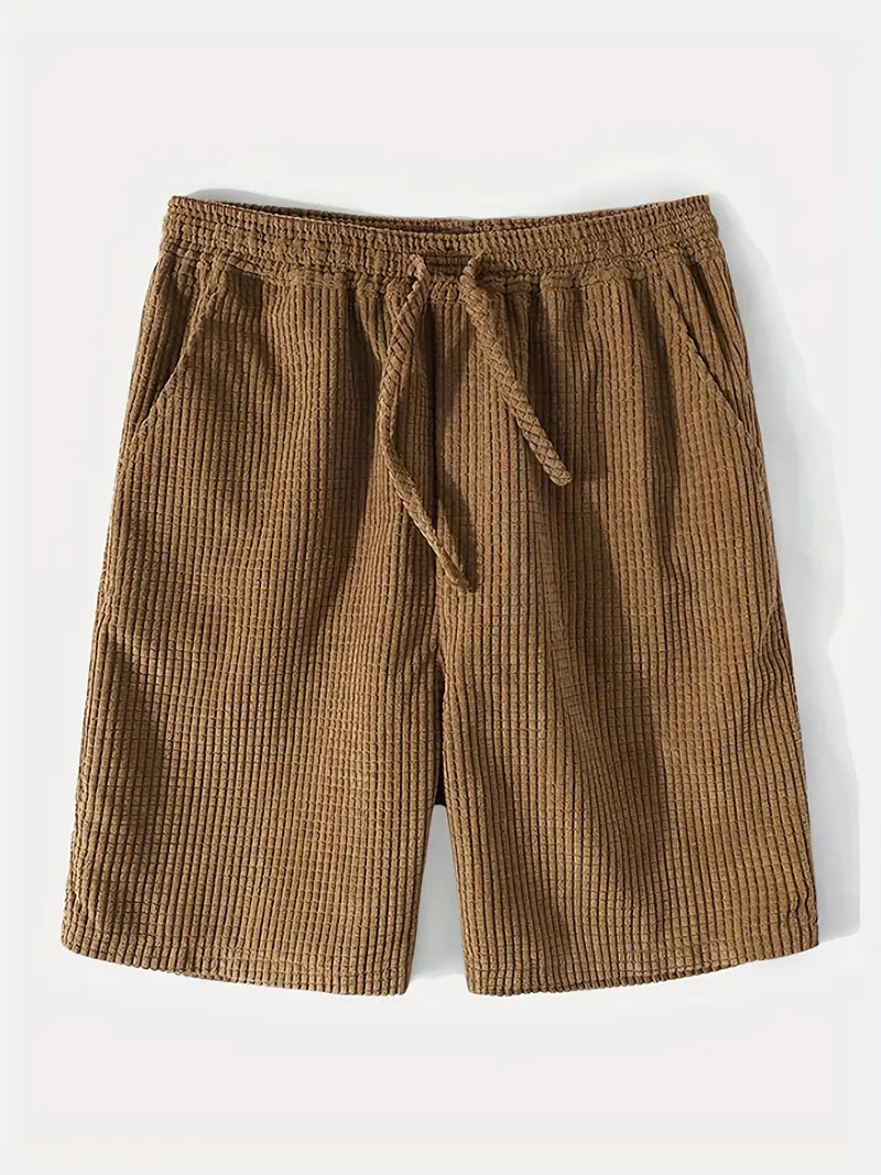 Stilig todelt herreklær sommersett; luftig kortermet skjorte og shorts for en komfortabel, moderne look.