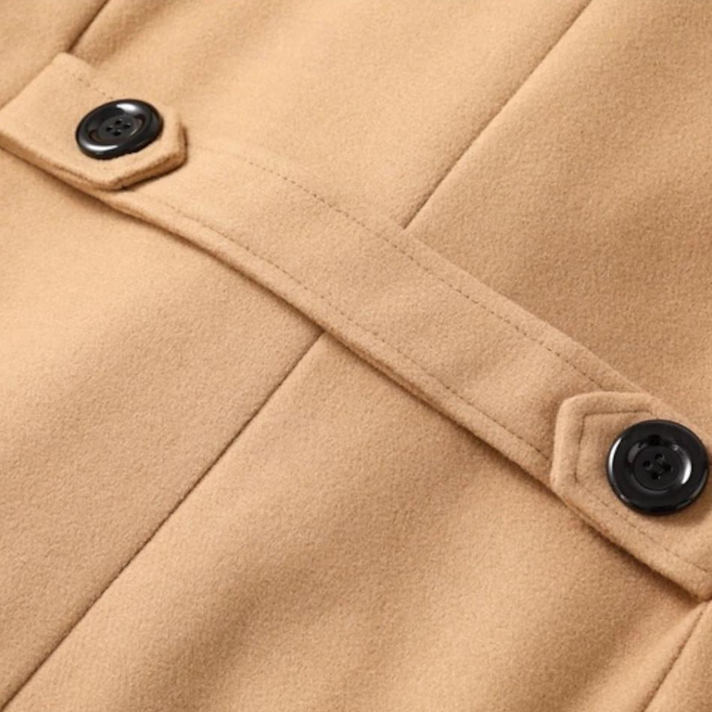 Klassisk herrefrakk som kombinerer eleganse og komfort for den moderne mannen.