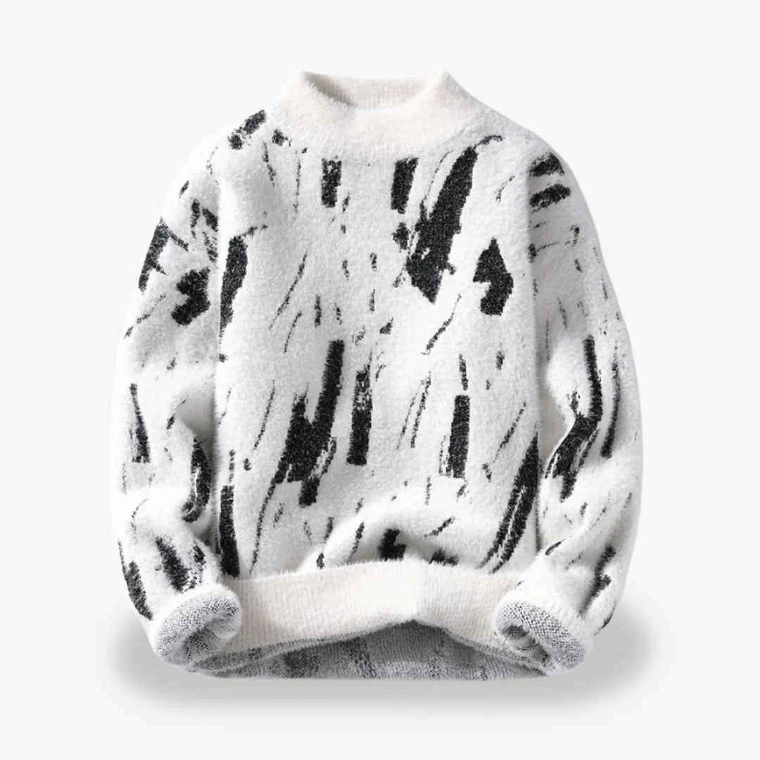 Mann i trendy herregenser med kumønster. Komfortabel og perfekt for lagdeling eller fritid.