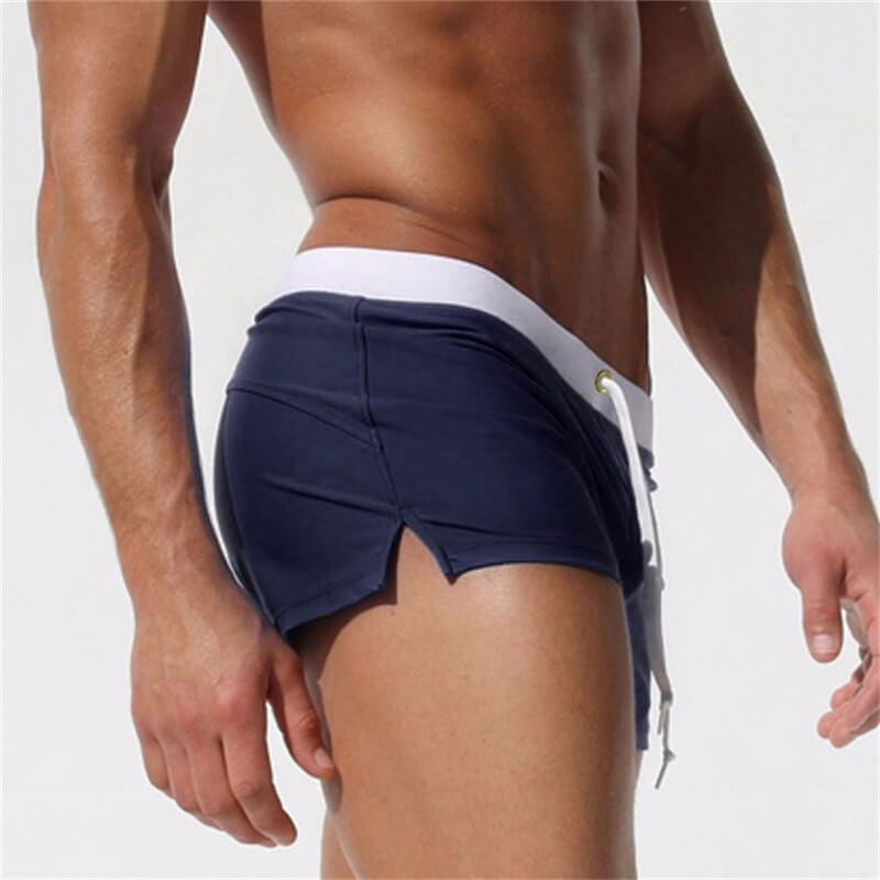 Boardshorts for menn med glidelåslomme, praktisk for sommer og vannsportaktiviteter.