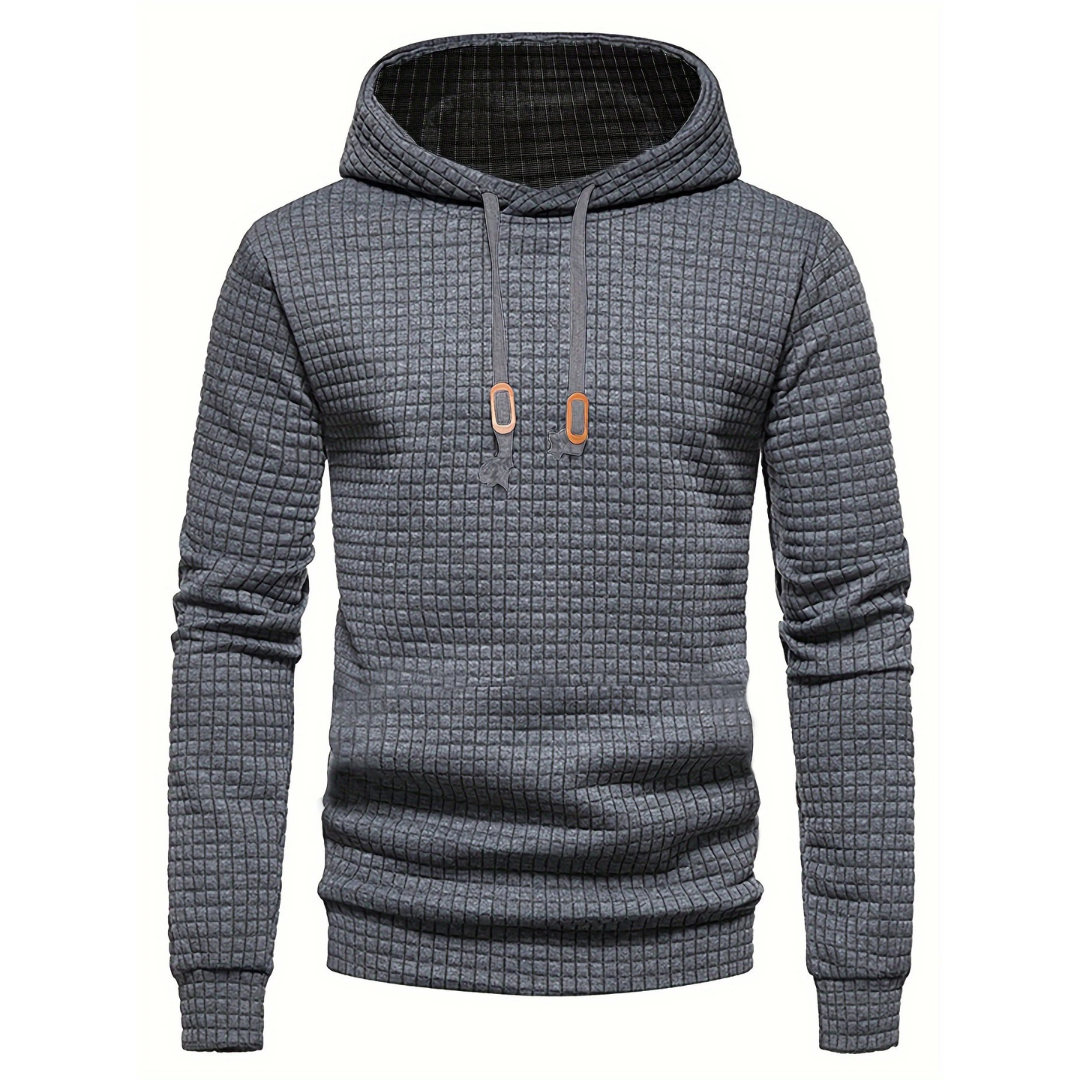 Behagelig herre hettegenser i lappeteppe-stil, mykt strikkestoff, urban look