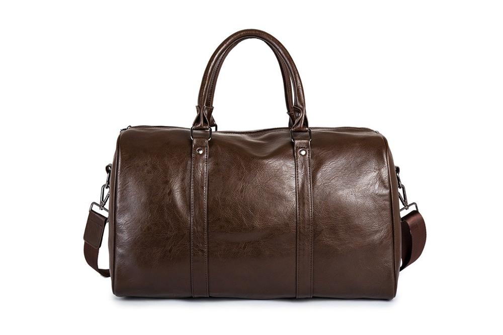Herre reisebagasje: Elegant svart skinn duffelbag, ideell som håndbagasje