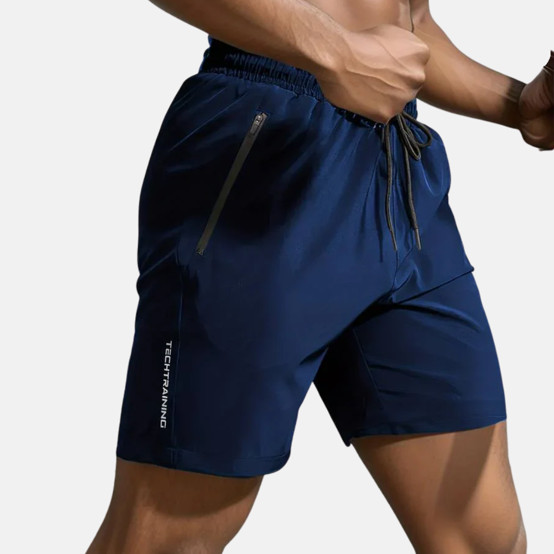 Sporty herreshorts med hurtigtørkende stoff for trening, jogging og fritid. Optimal for utendørs bruk.