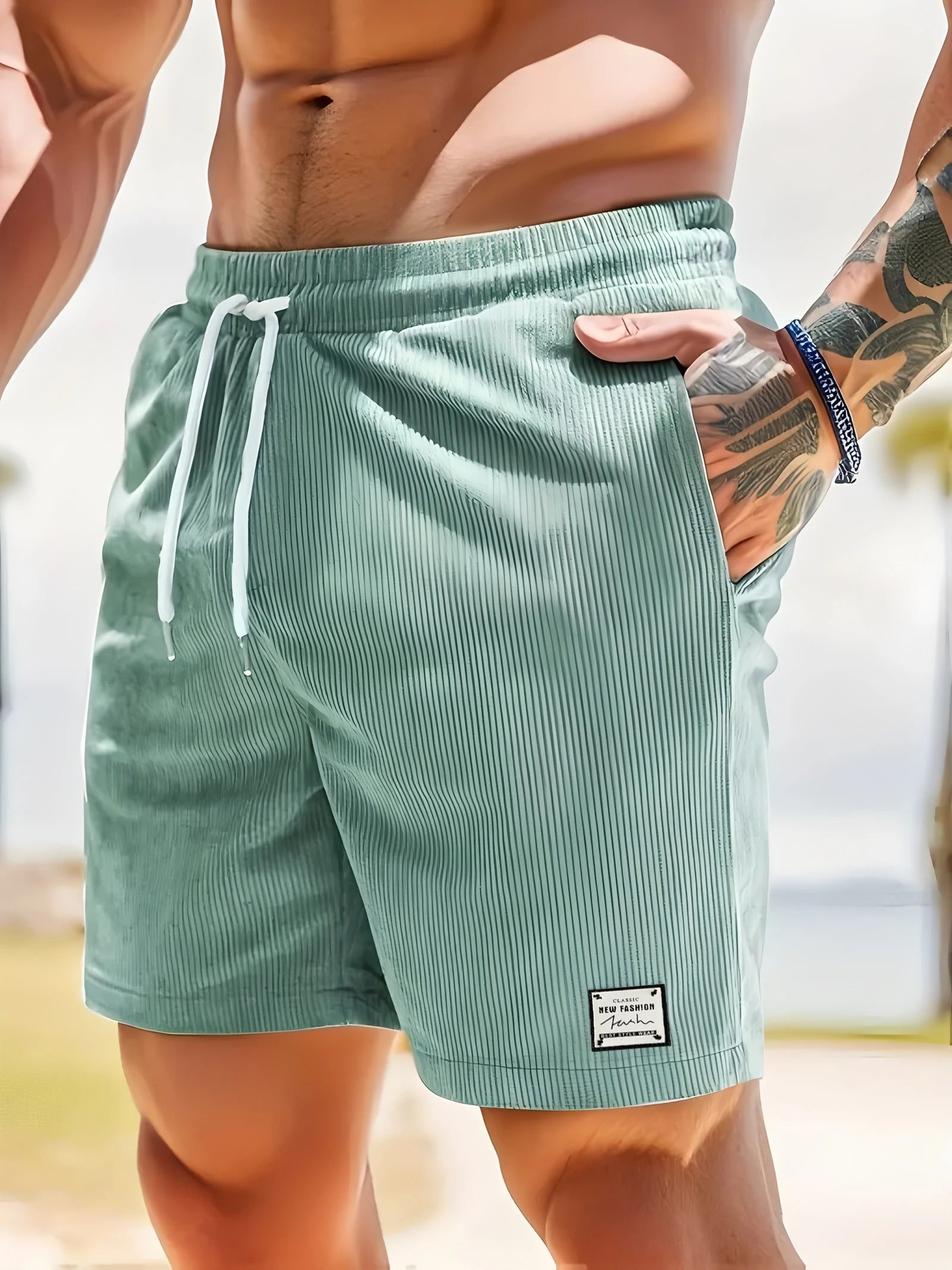 Allsidige herreshorts med elastisk midje; passer både til avslappet fritid og stilfull hverdagsbruk.