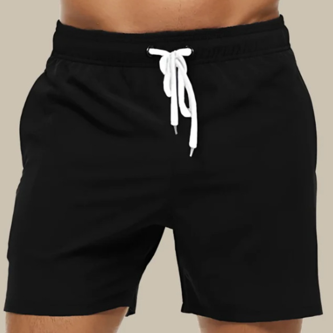 Aktive herre svømmeshorts for surfing, bading og strandaktiviteter. Hurtigtørkende komfort.