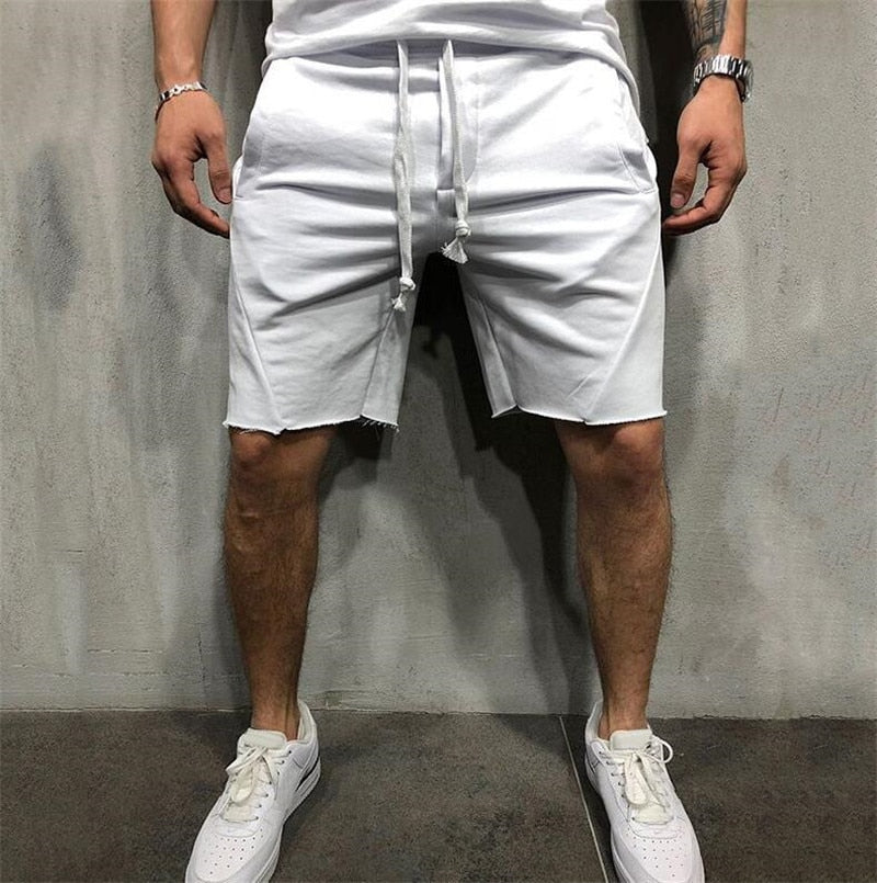 Nærbilde av stoffet på en sort herre shorts. Mykt og pustende for sommeren.
