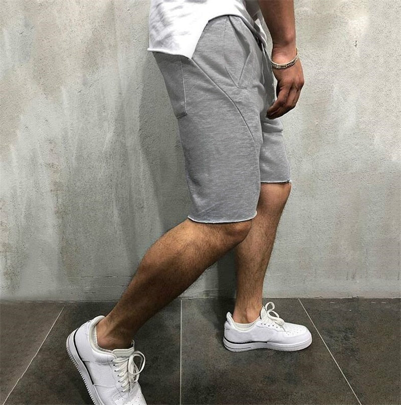 Stilig grønn herre shorts. Enfarget design, allsidig for fritid og sommer.
