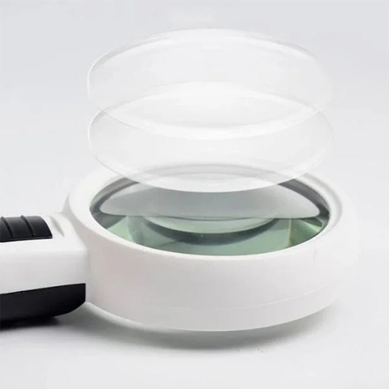Ergonomisk forstørrelsesglass, hvitt, med 30x optisk linse og LED-belysning for komfortabelt detaljarbeid.