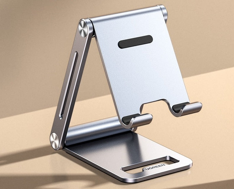 Robust universal telefonholder i aluminium, et stabilt skrivebordsstativ for mobil og nettbrett.