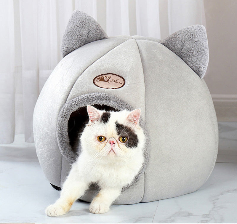 Komfortabel kjæledyrhule. Myk soveplass for katt eller liten hund, koselig design.