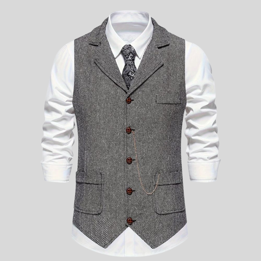 Tidløs herrevest med klassisk fiskebensmønster, en elegant og allsidig dressvest for den moderne mann.