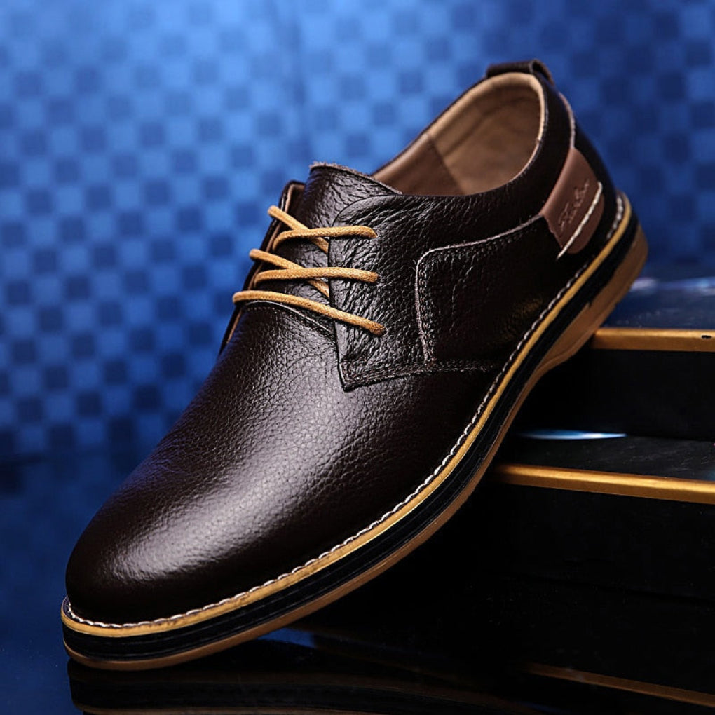 Klassisk svart Oxford-dressko for menn. Elegant formell sko med komfort, ideell for stilfulle anledninger.