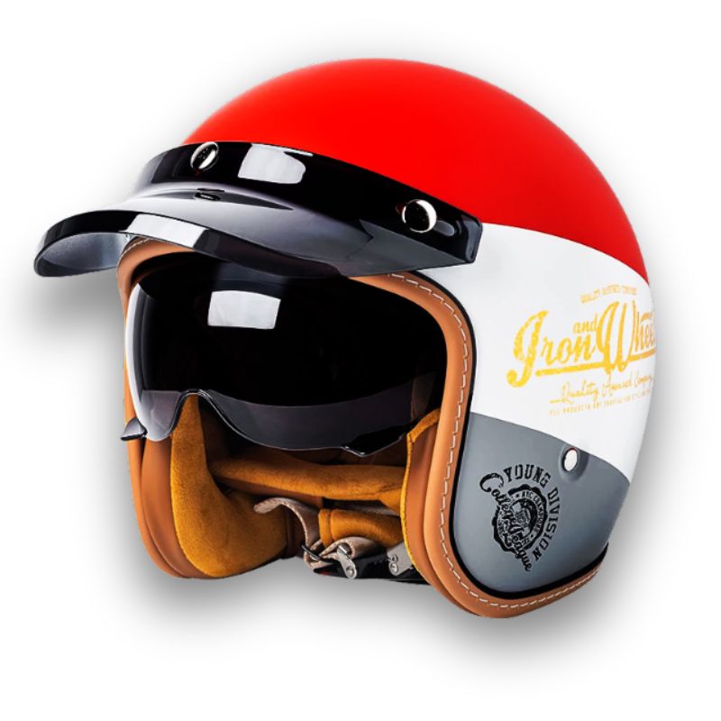 Klassisk unisex motorsykkelhjelm med doble visirer for optimal sikkerhet og komfort.
