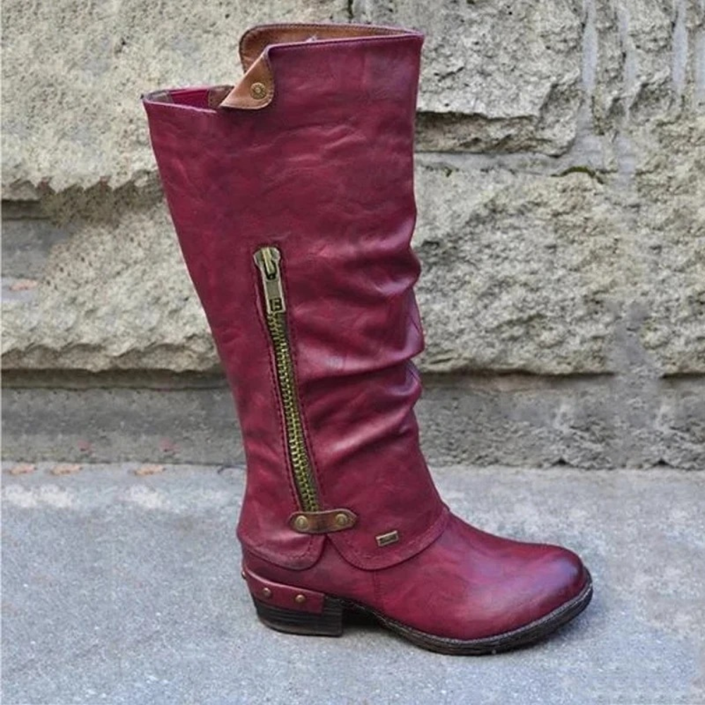 Tidløse knehøye damestøvler i sort, en stilfull og komfortabel klassiker for høst og vinter. Elegante dameboots.