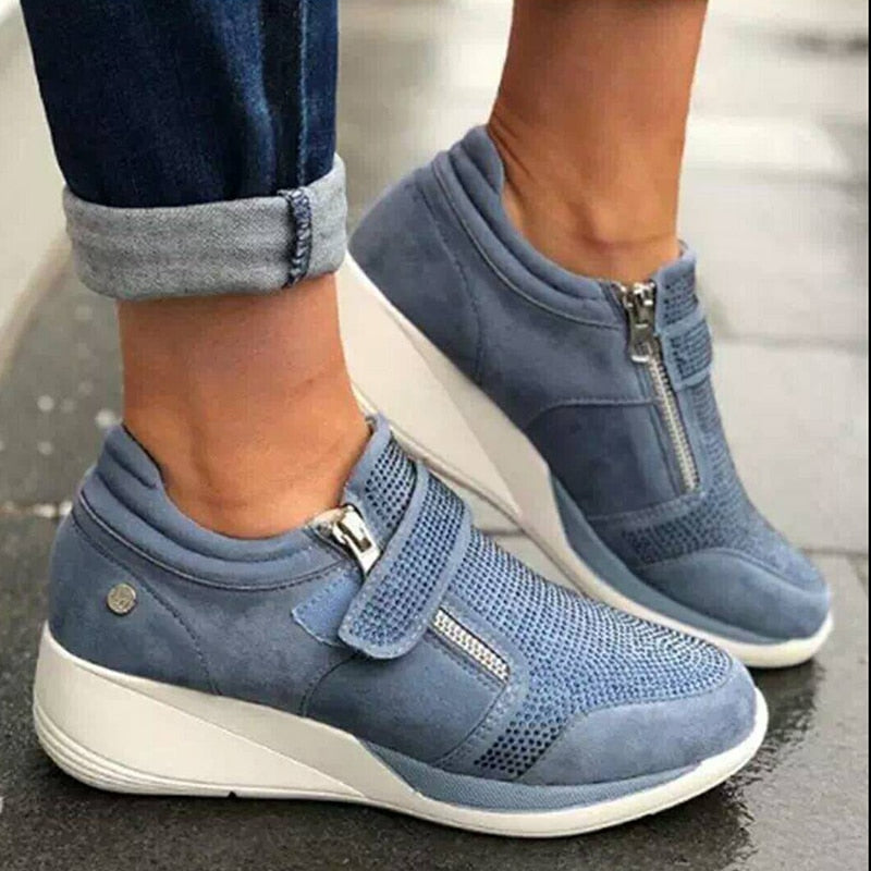 Lettvektige damesneakers med glidelås, perfekt for aktive kvinner som ønsker komfort.