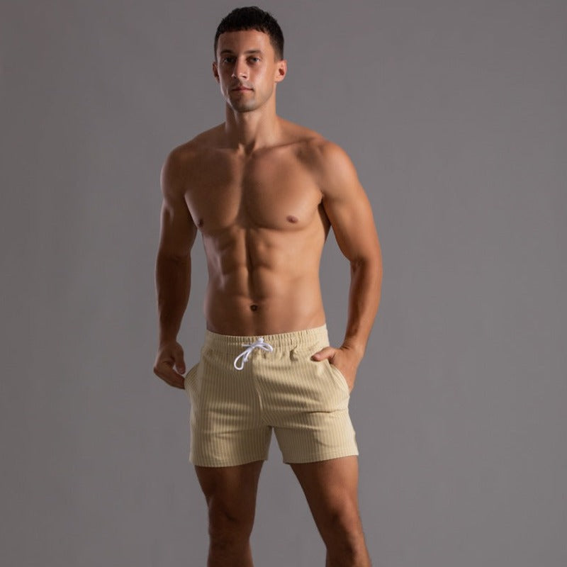 Casual herreshorts i trendy design, flott for strandturer og sommeraktiviteter. Modern herremote.