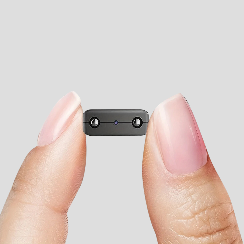 Kompakt Full HD minikamera med WiFi for diskret sikkerhetsovervåking. Ideelt for hjem eller kontor.