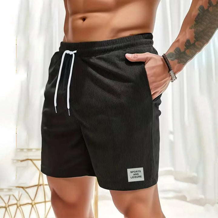 Menns komfortable shorts i kordfløyel med justerbar snøring, perfekt passform for avslapning.