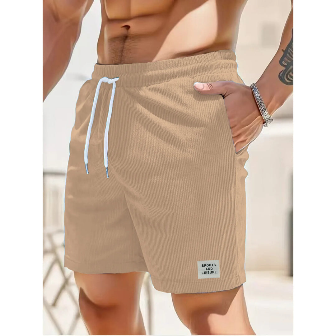Detaljert bilde av kordfløyels shorts for menn, viser myk tekstur og snøring.