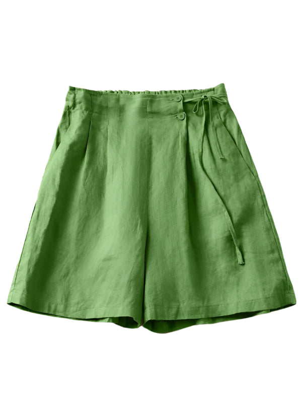 Kvinne baggy shorts med avslappet passform for vår og sommer. Komfortable dameshorts for fritid og hverdag.