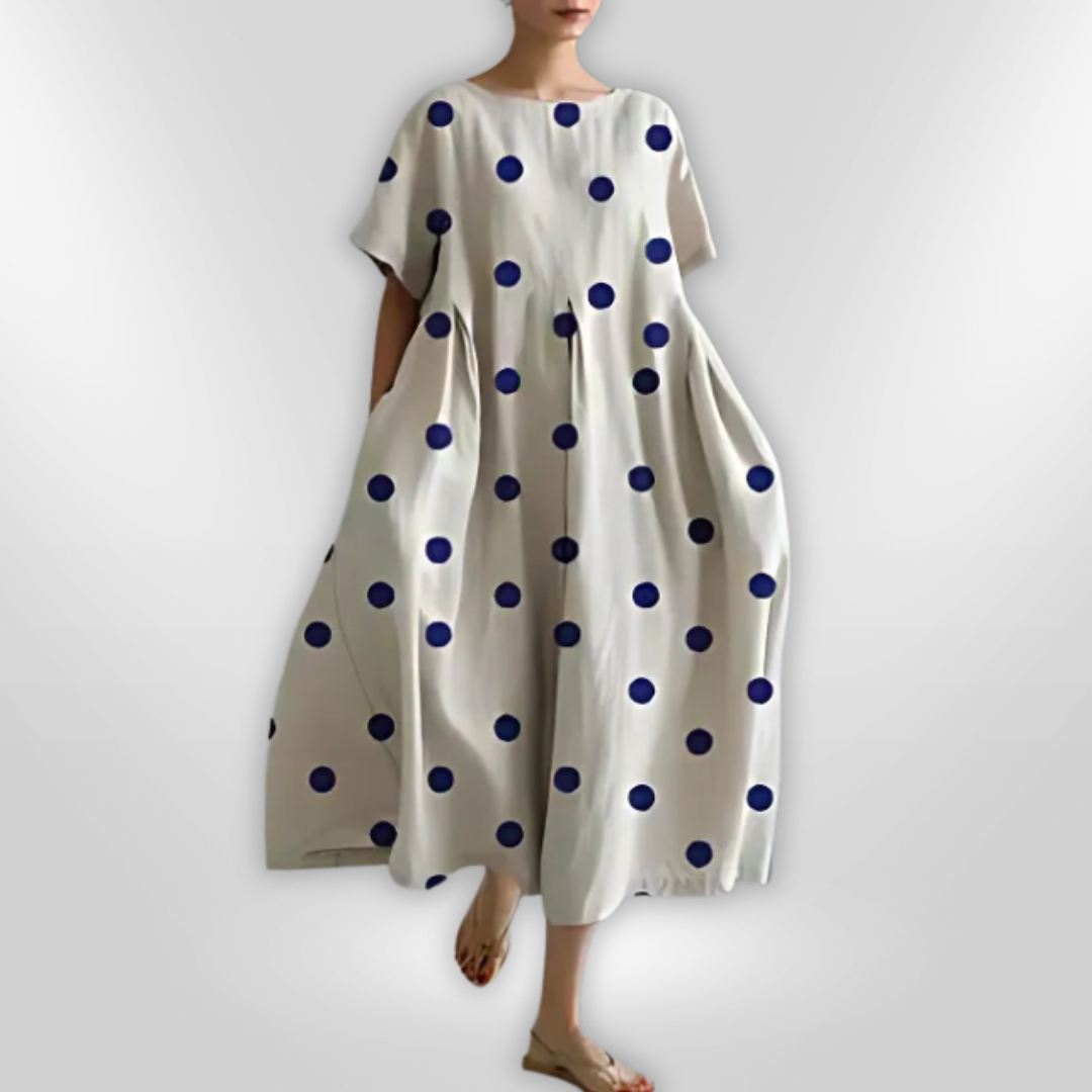 Vår/sommer kvinnekjole: Elegant floral maxikjole med løs passform, ideell som fest- eller hverdagskjole.