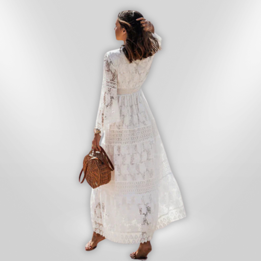 Kvinne boho vårkjole med lange ermer, perfekt som hverdagskjole. Komfortabel og elastisk polyester for sommerbruk.