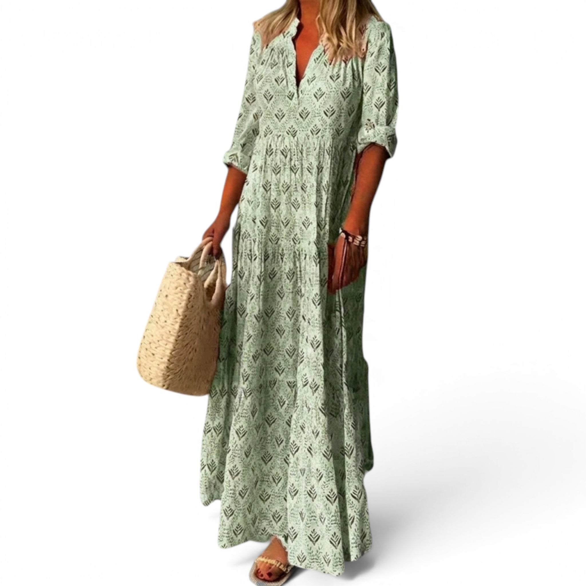 V-hals maxi kjole i lett stoff med unikt vintage print. Perfekt for varme dager, gir komfort og stil.