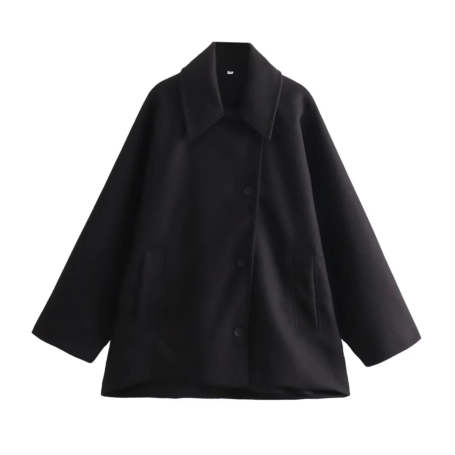 Allsidig oversized dame vinterfrakk. Med lange ermer og knapper for en elegant, varm og praktisk vinterstil.