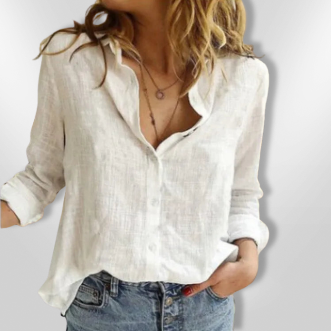 Kvinnechemise med fuglemotiv, langermet, knappebluse. Avslappet passform, perfekt for vår og sommer.
