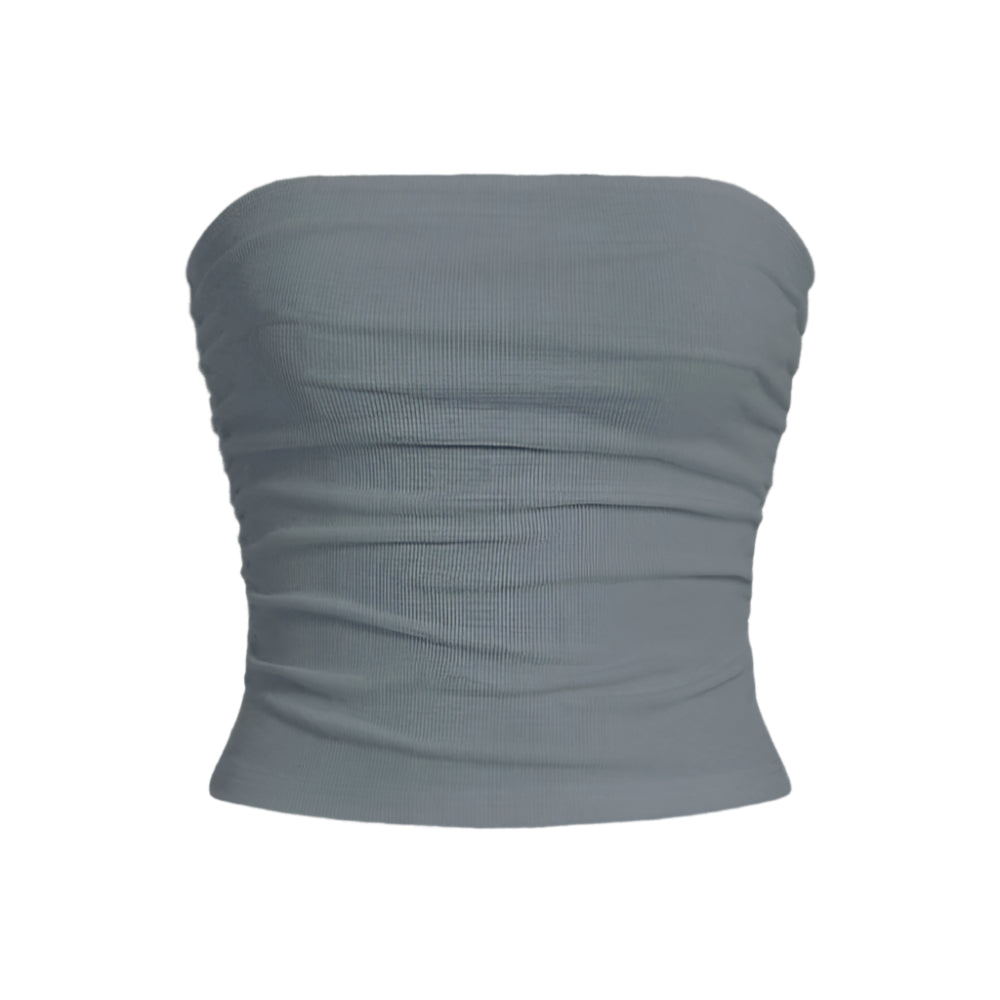 Elegant ermeløs overdel til dame. En moderne og allsidig fitted tanktopp for casual og pen bruk.