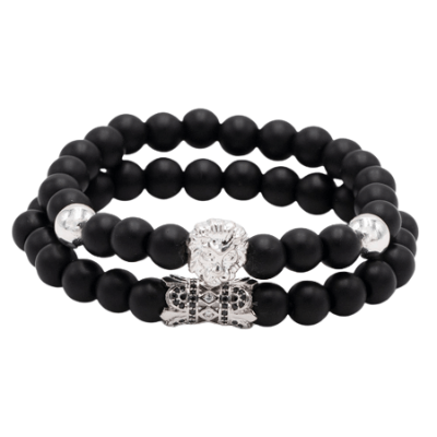 Detaljert metall løvehode på et kvinner natursteinarmbånd. Symboliserer mot, styrke og indre selvtillit.