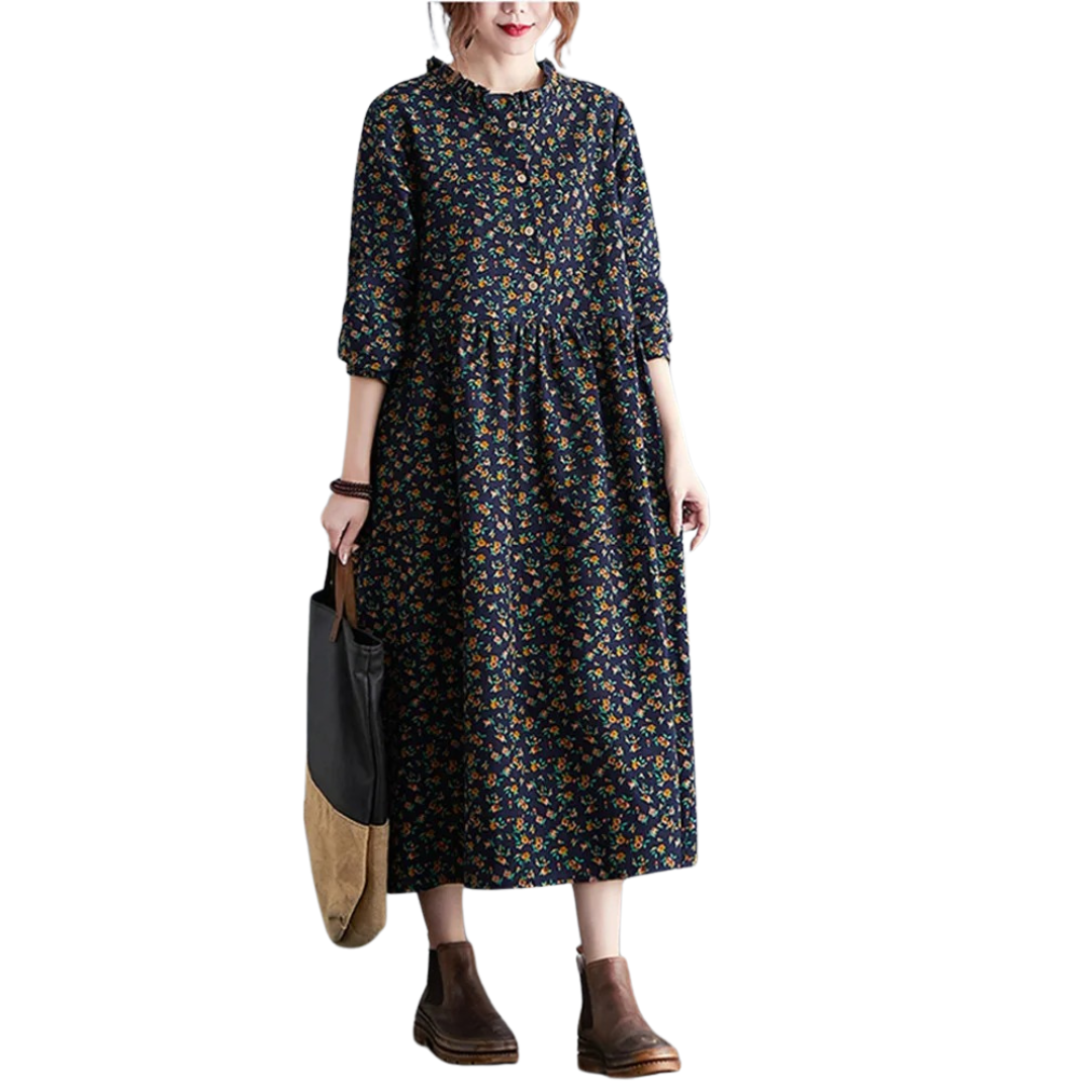 Elegant retro volangkjole med blomstermønster. Komfortabel og langermet vintage kjole for kvinner.