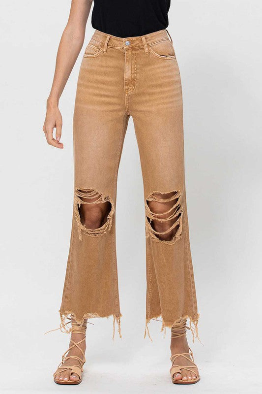 Gullfargede crop flare damejeans i 90-talls stil. Vintage inspirerte kvinner jeans for en unik og trendy look.