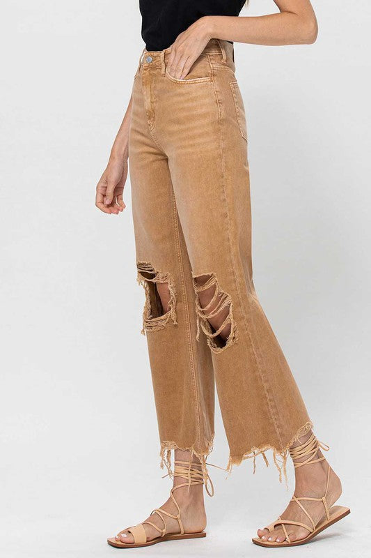 Fashionable gull 90-talls crop flare damejeans. Stilige kvinner bukser med vintage design og moderne passform.