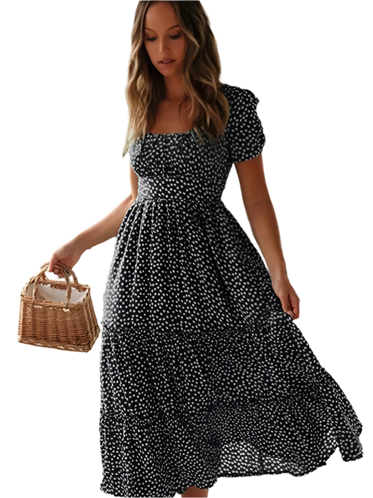 Vintagestil blomstret maxikjole med puffermer og firkantet hals. En komfortabel og elegant sommerkjole.