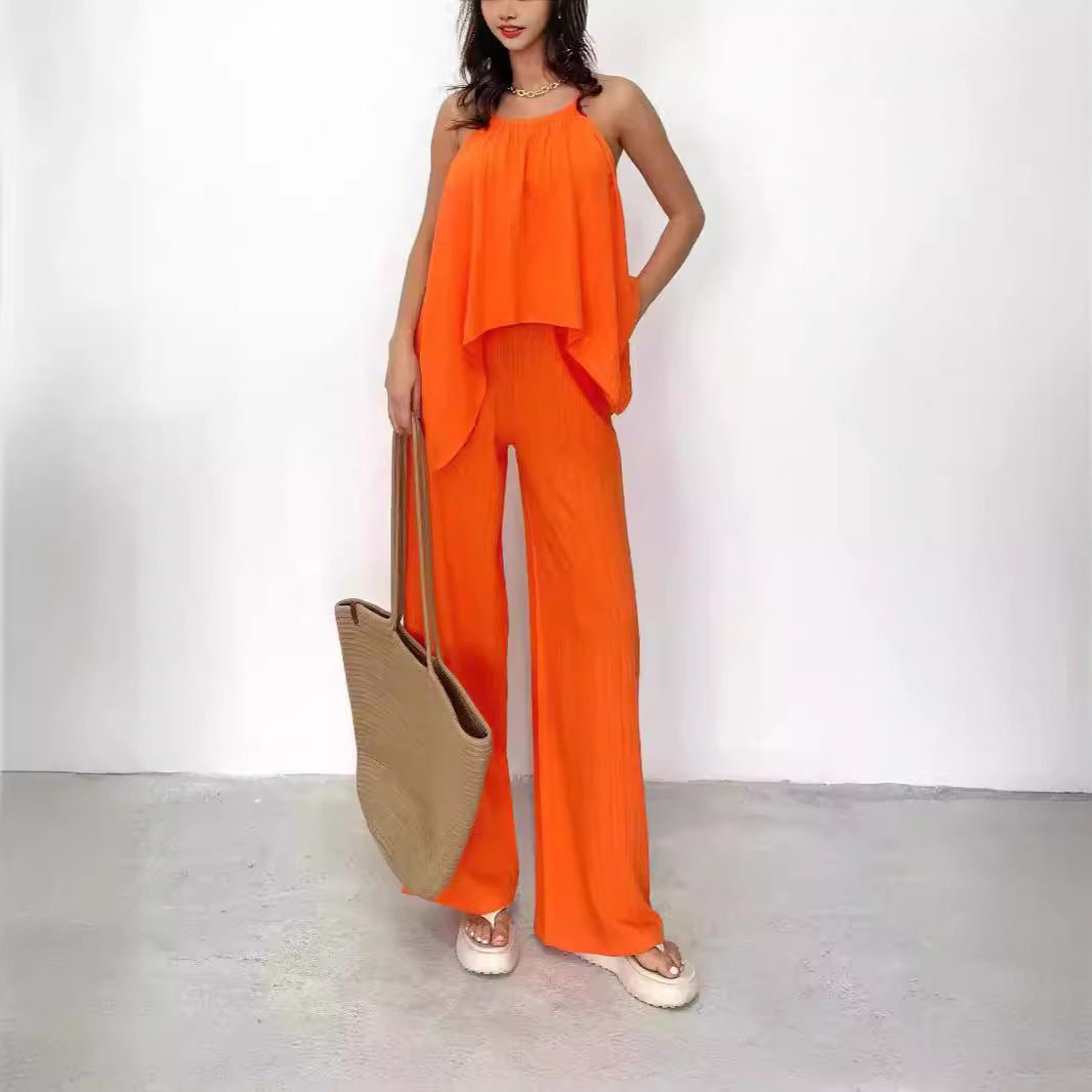 Moderne kvinners buksesett med asymmetrisk topp, elegant stil for fritid og sommer. Komfortabel og chic.