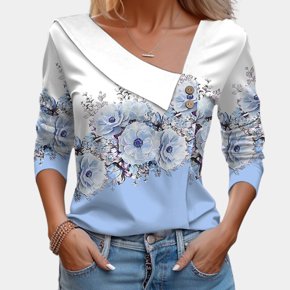 Allsidig kvinners bluse med elegant blomstermønster, langermet, egnet for både kontor og fritid.