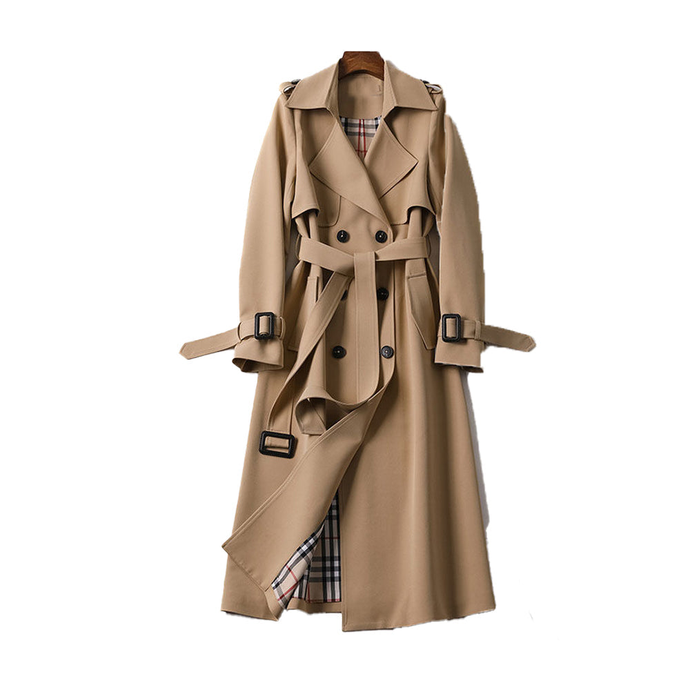 Detalj av kvinners klassisk dobbelknapp trenchcoat. Elegant design med belte, perfekt for allsidig bruk.