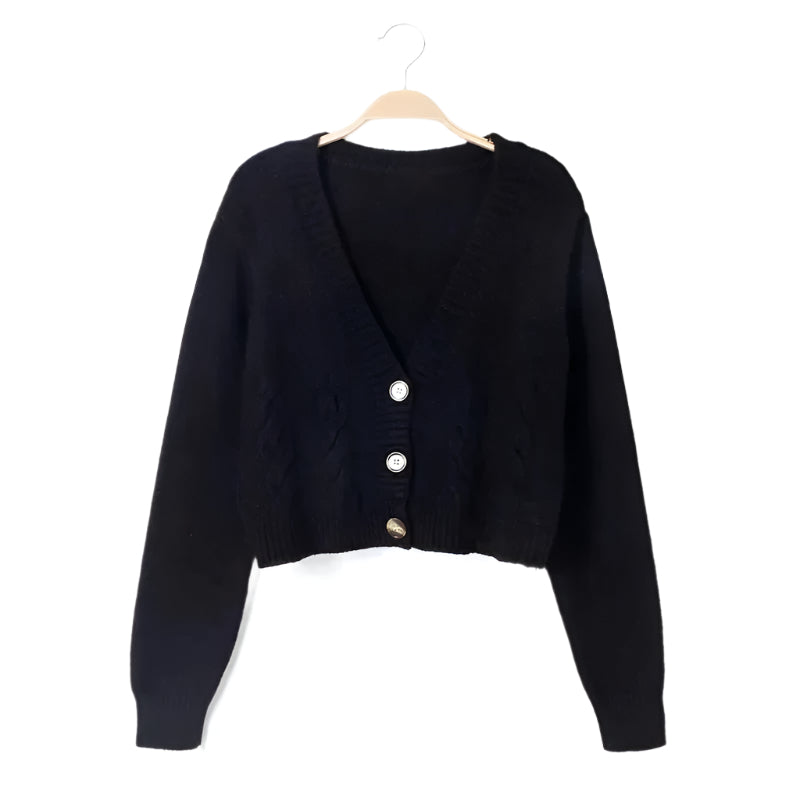 Elegant svart V-hals cardigan for kvinner, strikket og komfortabel for en moteriktig look.